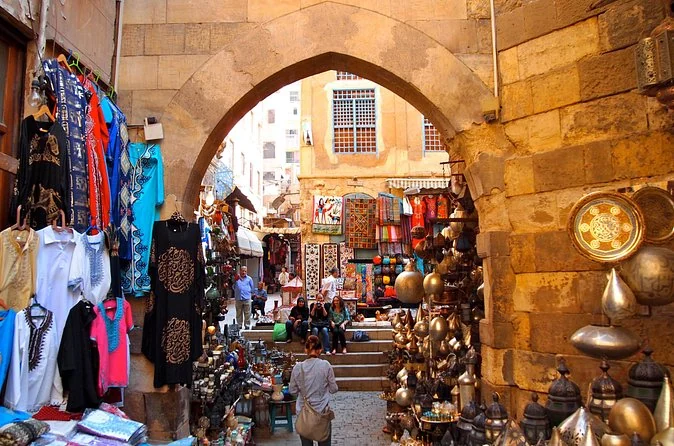 Stone arch at the entrance to Khan el-Khalili with shops underneath